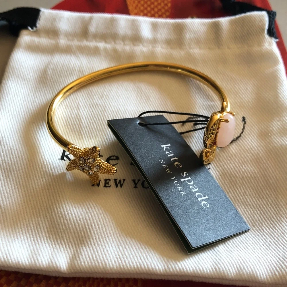 Authentic New/tag kate spade Gold Tone Open-Ended Cuff with a starfish and crab - Picture 2 of 10
